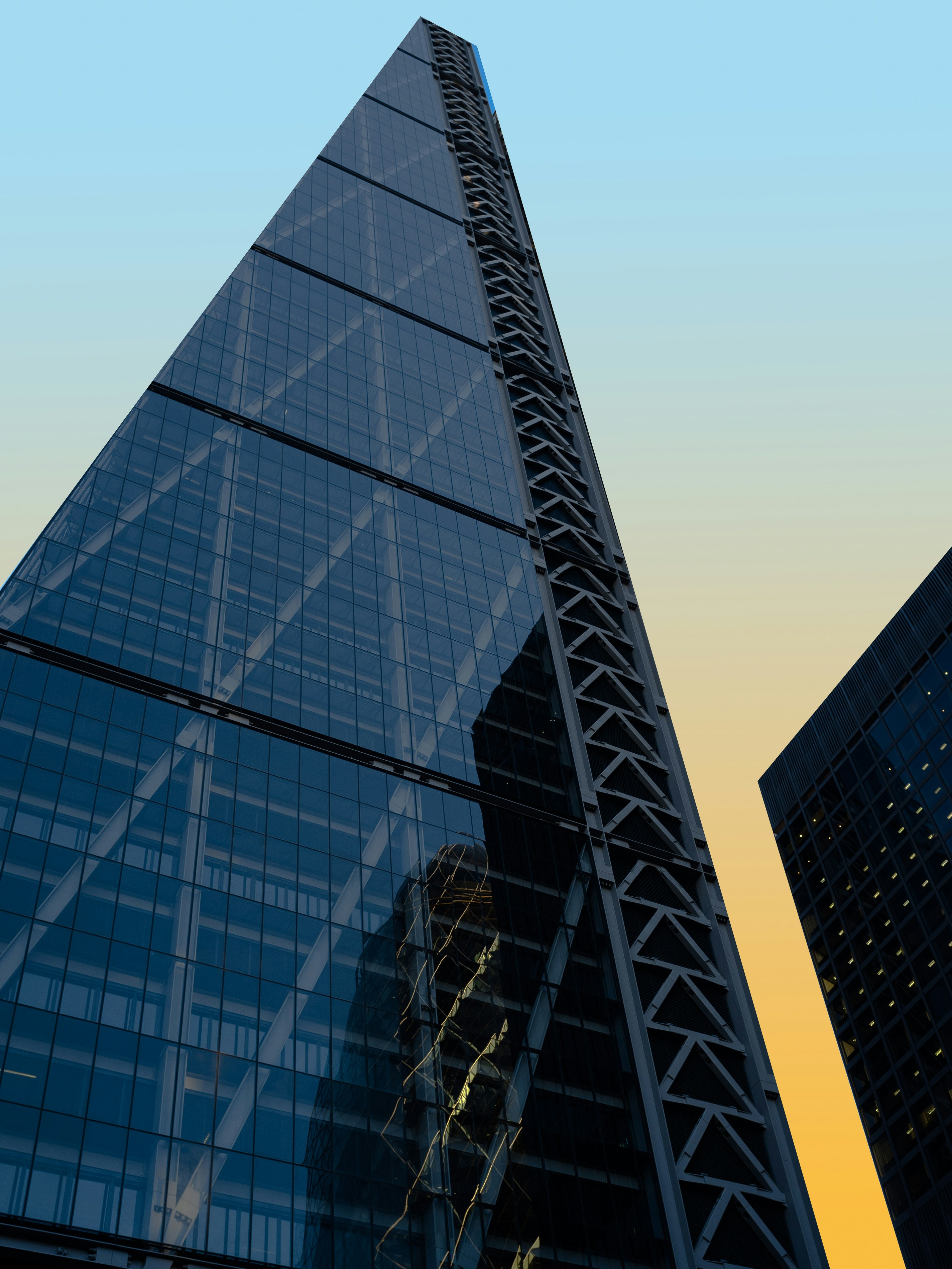 black and white glass walled high rise building